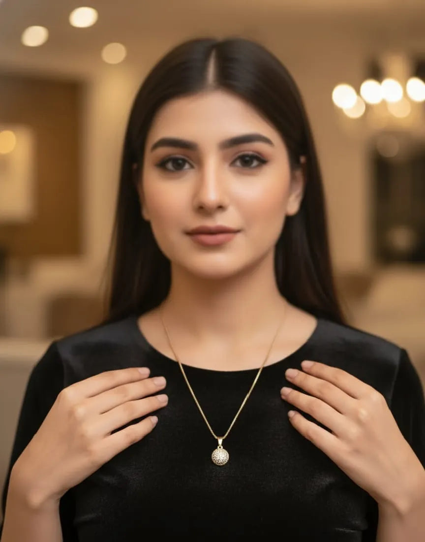 Woman wearing a necklace in an indoor setting