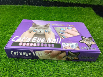 Box of cat's eye nail art product on a grassy background