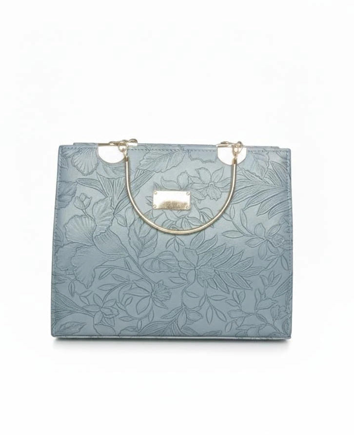 Blue floral-patterned handbag with gold handles on a white background