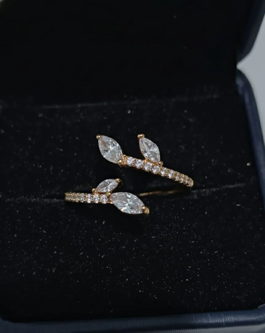 Woman wearing a ring with a floral design outdoors