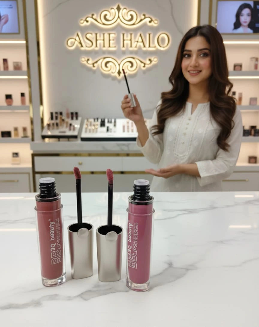 Set of lip glosses in a display case with '3Q beauty' branding on a grass background