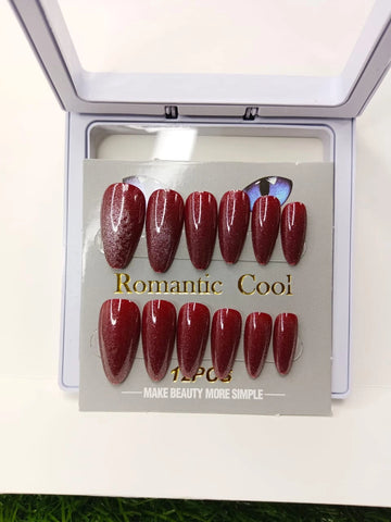 Red nail art design set in a white box with 'Romantic Cool' branding.