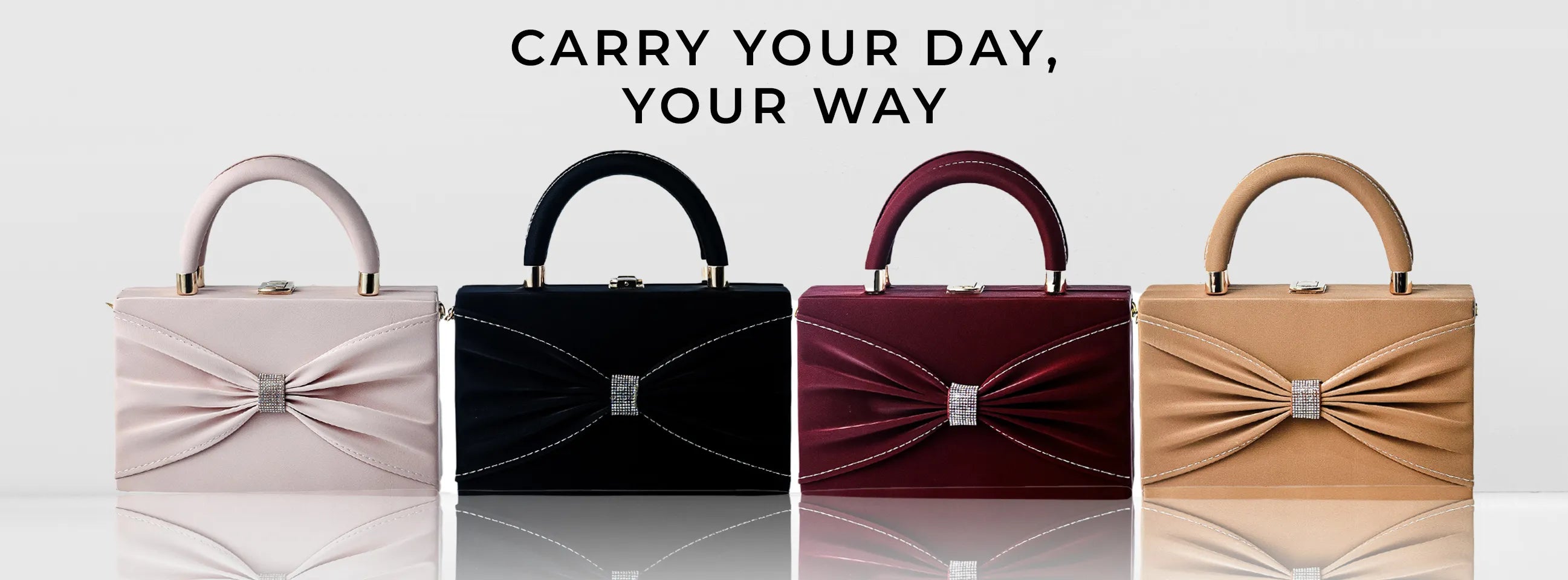 Four handbags colors with a reflective surface below.1621243260e1af0c20-0