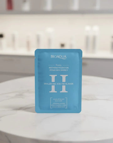 Blue facial mask package with 'Bioaqua' branding on a white surface.