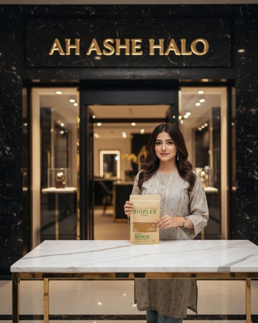 Woman holding a Bioplex package in front of a display with 'H Ashe Halo' branding.