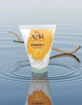 Tube of A&L Vitamin C Face Wash on water with a branch