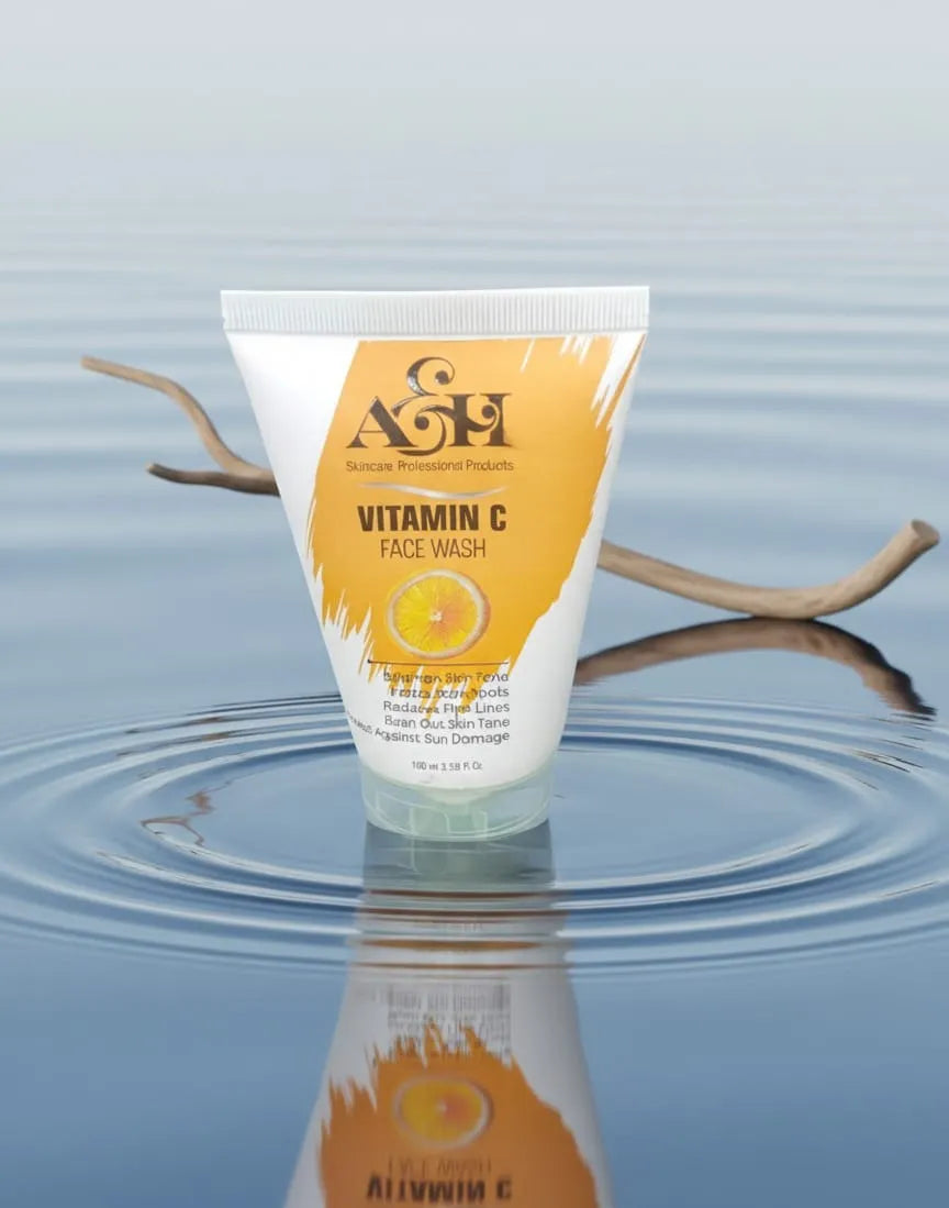Tube of A&L Vitamin C Face Wash on water with a branch